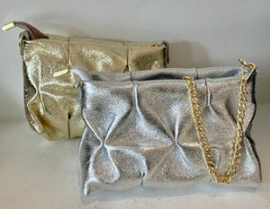 Clutch brilhante repuchados