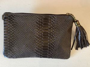 Clutch réptil
