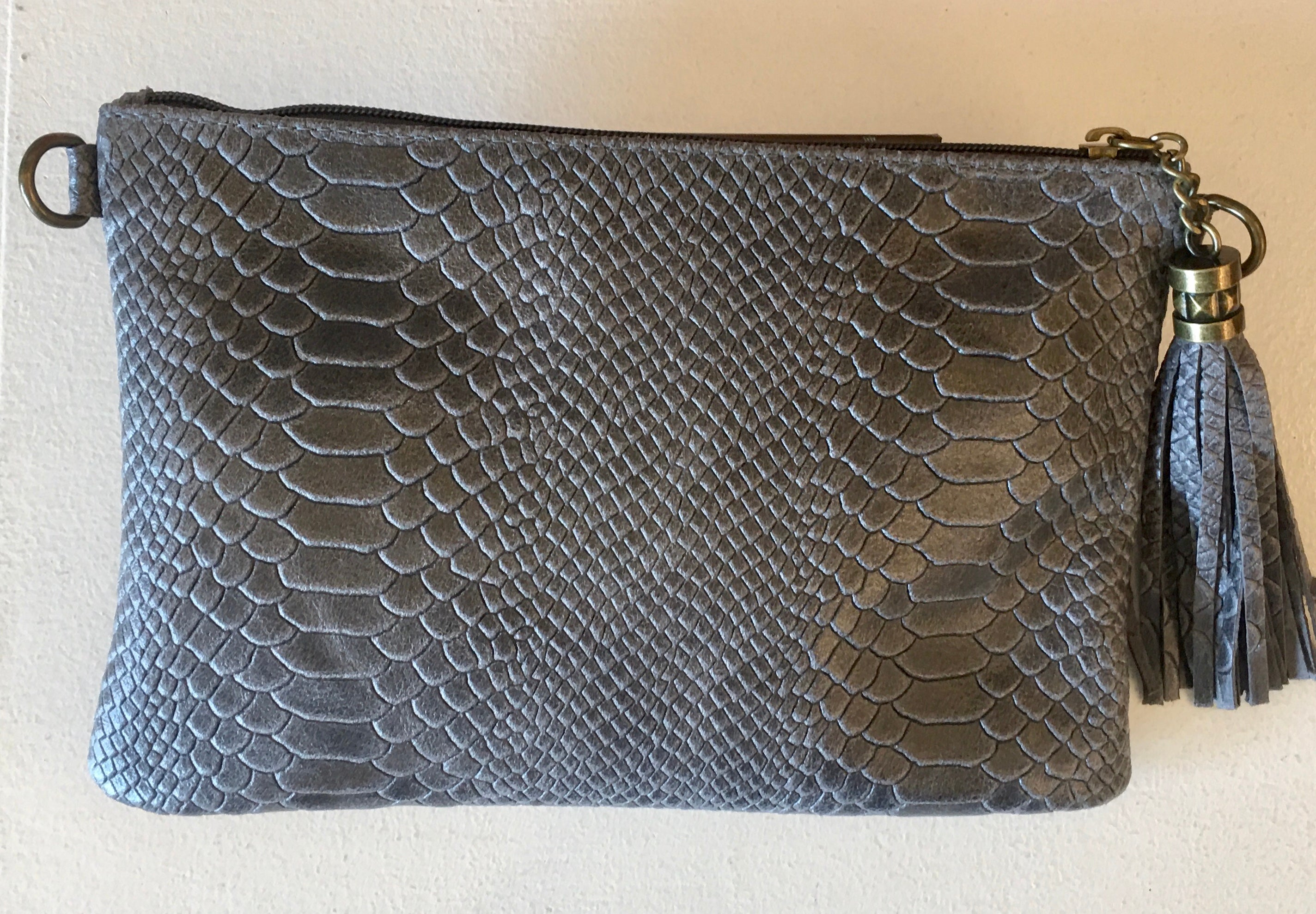 Clutch réptil