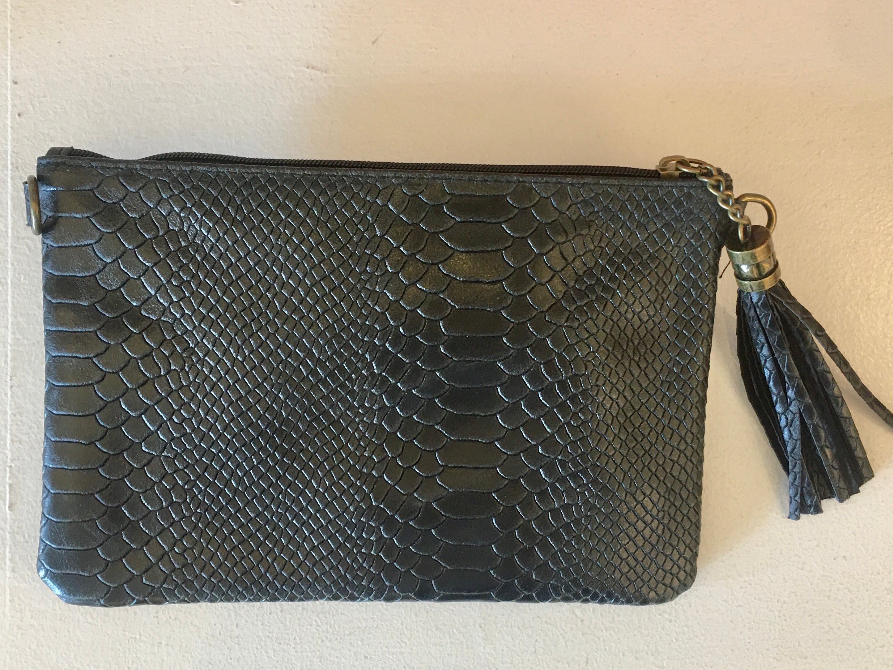 Clutch réptil