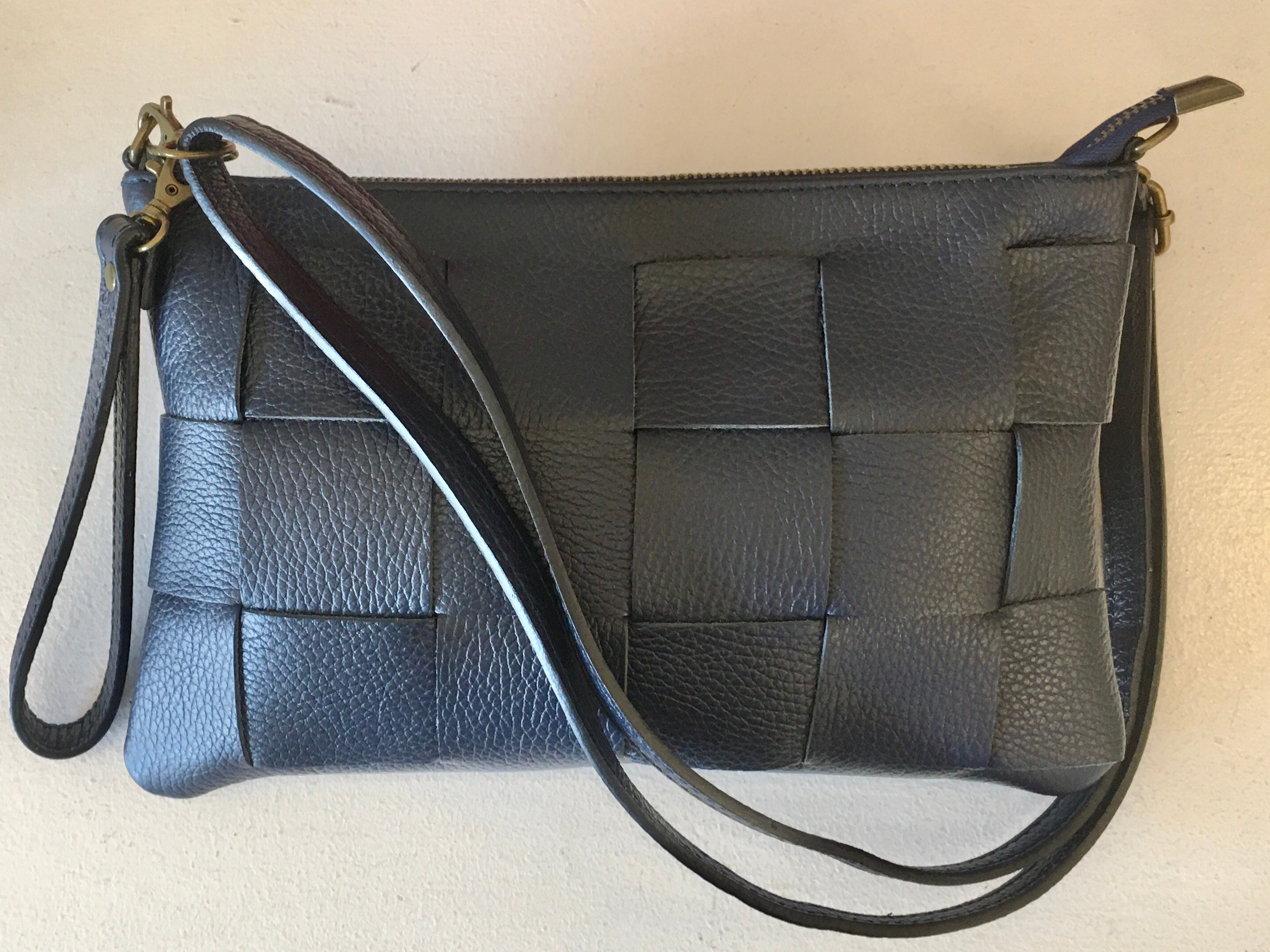 Clutch pele entrançada