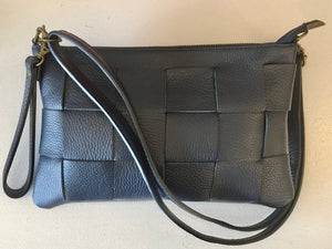 Clutch pele entrançada