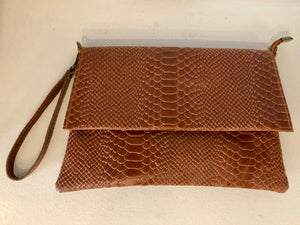 Clutch réptil com pala