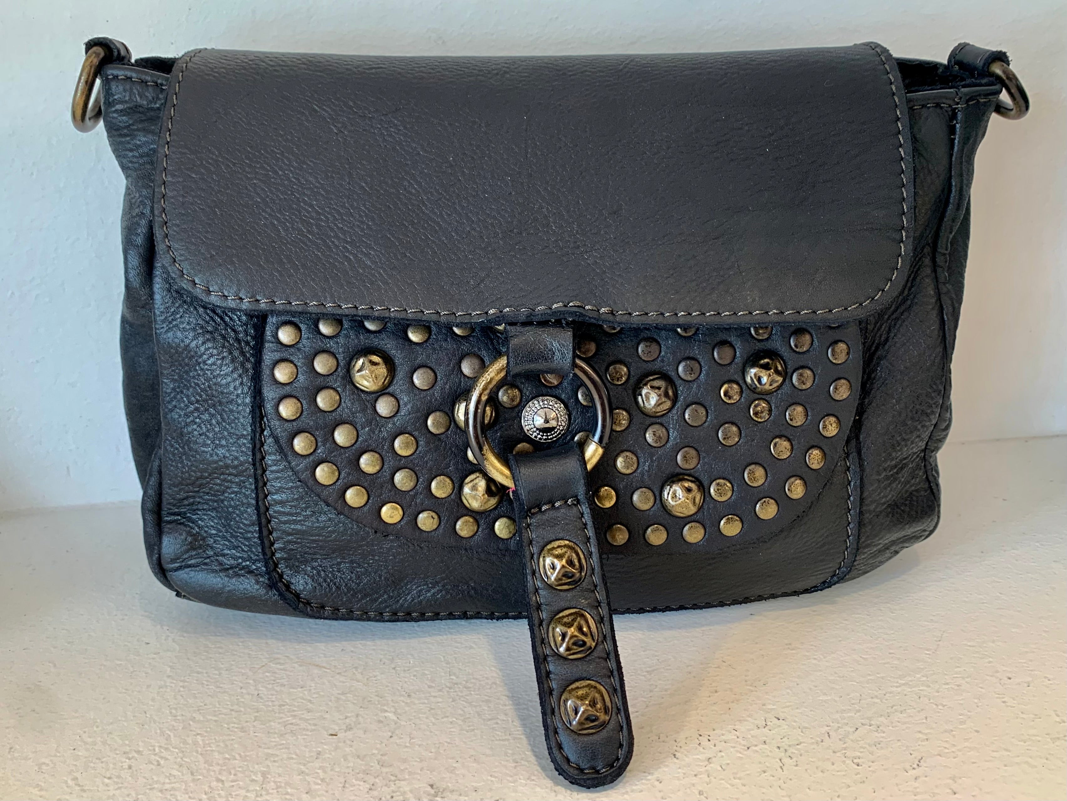 Mala pala e bolso tachas